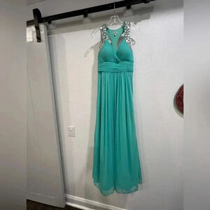 Cache turquoise prom dress with heavy crystal details. Sz 8​​
